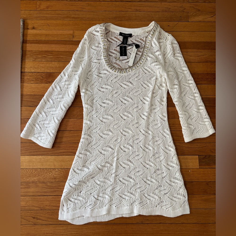 NWT Black White Market Tunic
White with beautiful jeweled neckline